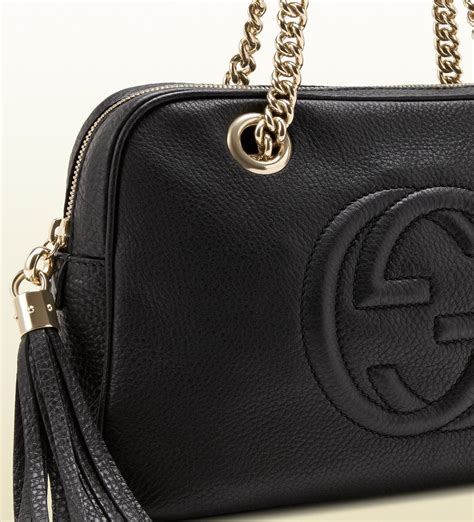 gucci black leather shoulder bag.